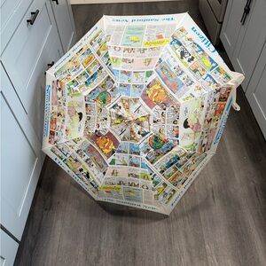 Source Unknown Comic Strip Umbrella with Blue Accents